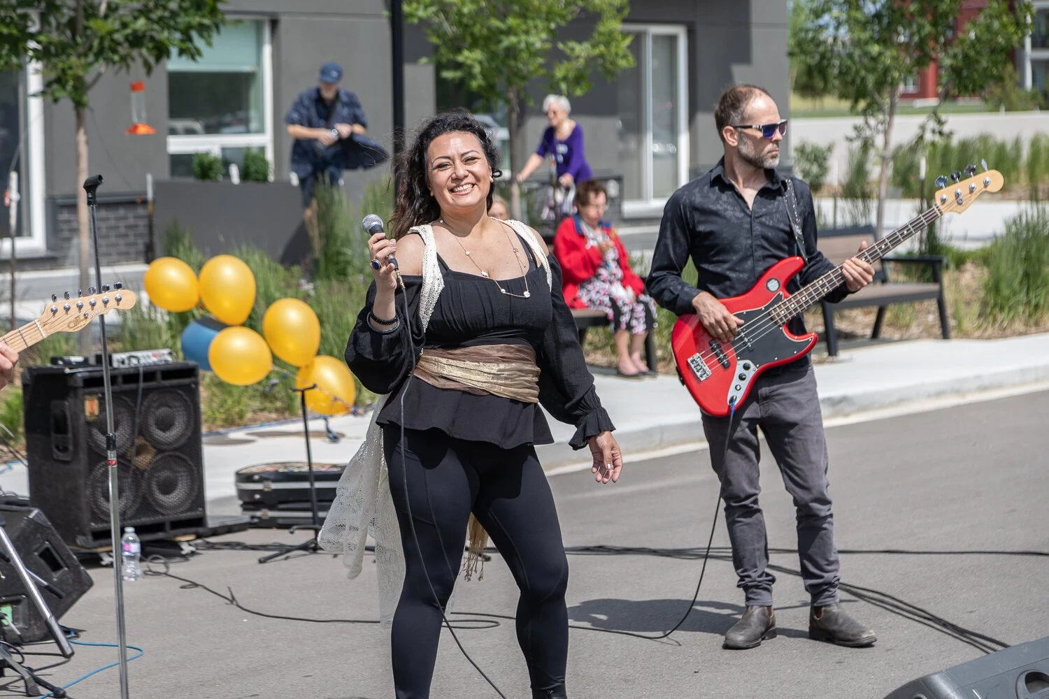 A lady singing on a event