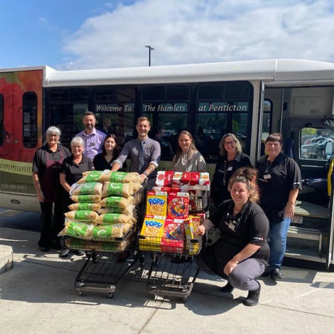 Food donations in front of a bus