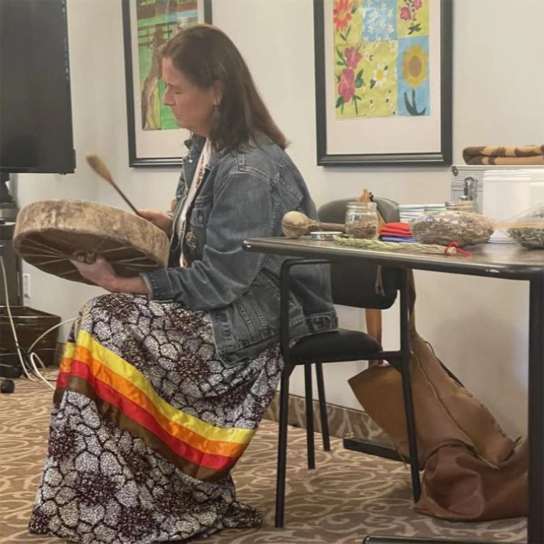 Woman playing the drum