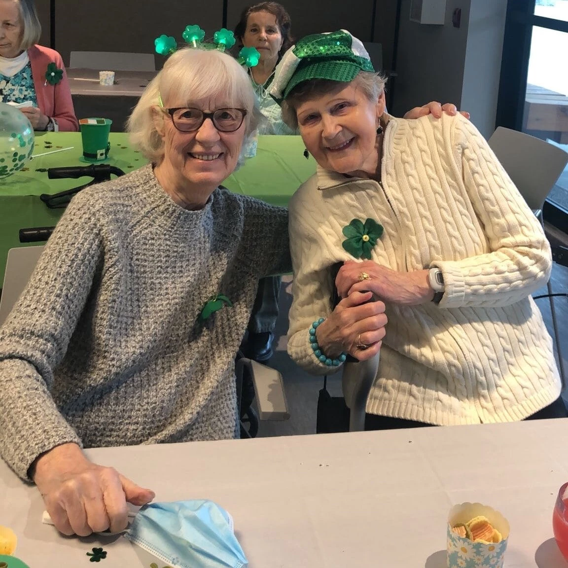 Two ladies enjoying together in the party